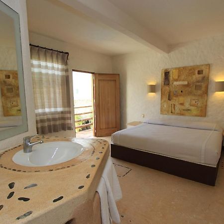 Hotel Plaza Tangolunda Kültér fotó