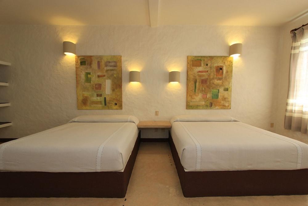 Hotel Plaza Tangolunda Kültér fotó