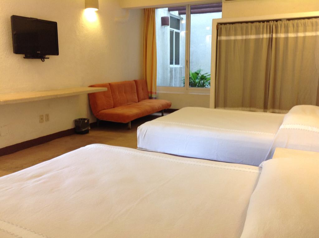 Hotel Plaza Tangolunda Kültér fotó
