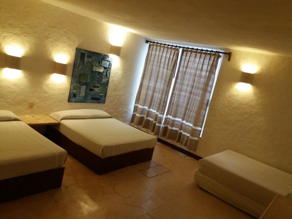 Hotel Plaza Tangolunda Kültér fotó