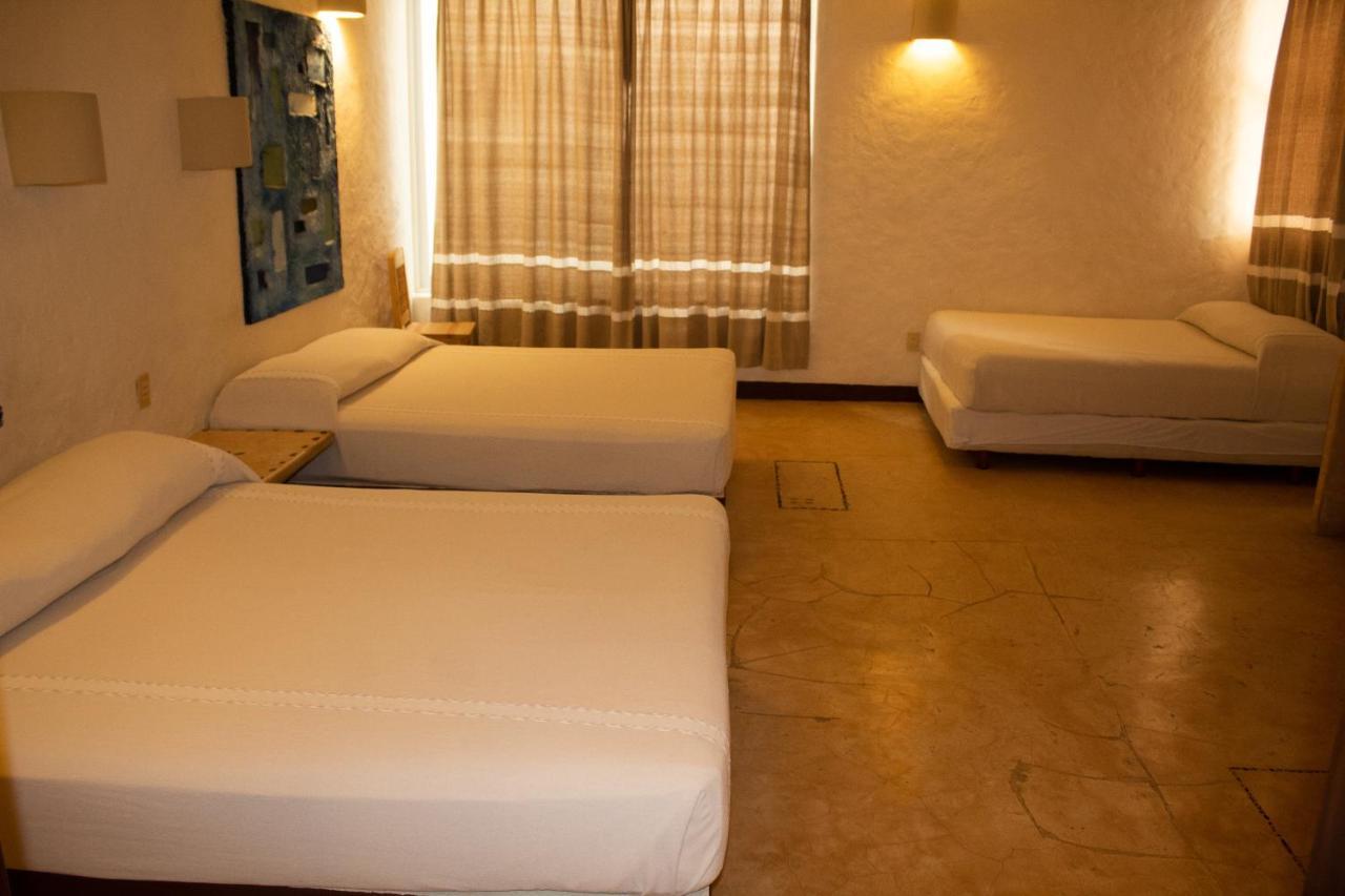 Hotel Plaza Tangolunda Kültér fotó