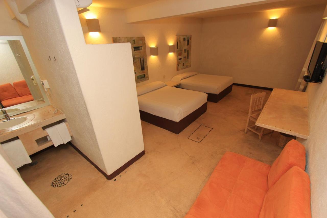 Hotel Plaza Tangolunda Kültér fotó