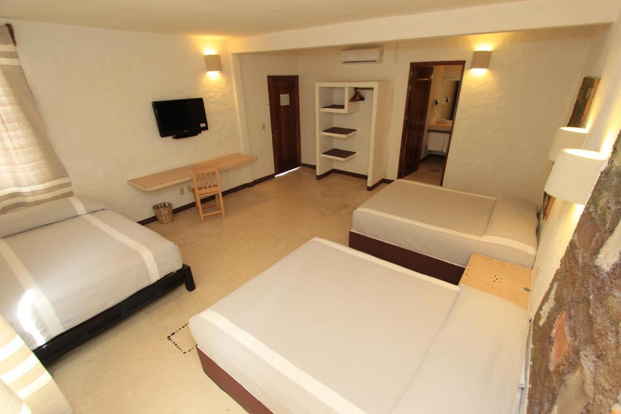 Hotel Plaza Tangolunda Kültér fotó