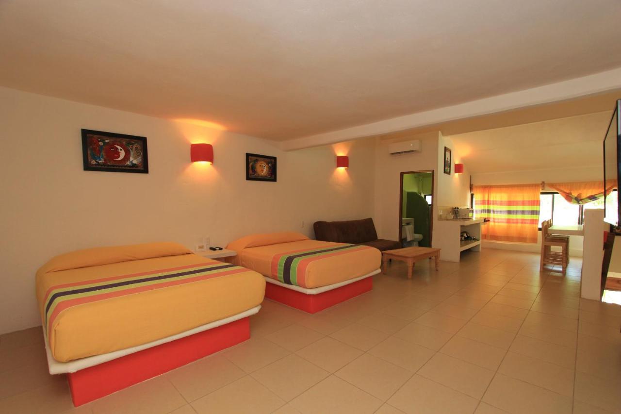 Hotel Plaza Tangolunda Kültér fotó