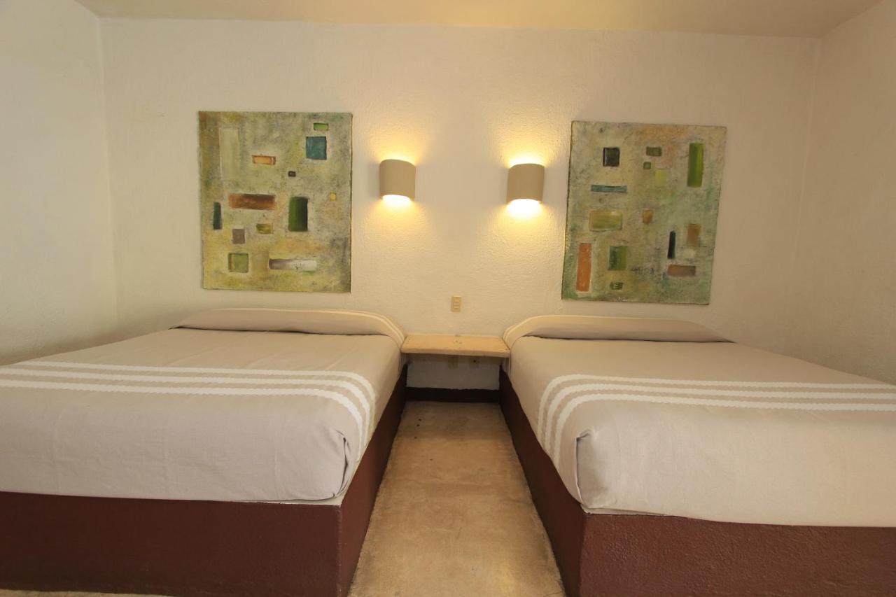 Hotel Plaza Tangolunda Kültér fotó